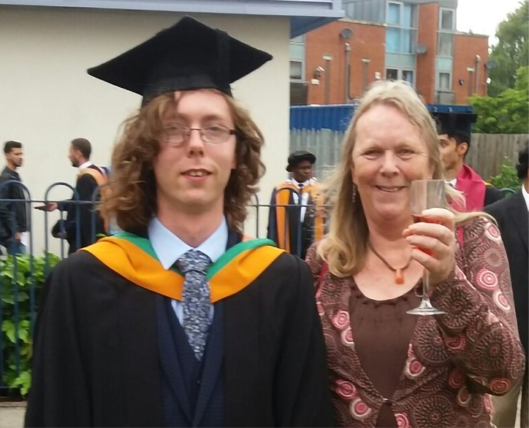 Time bank member and her son at the graduation ceremony.